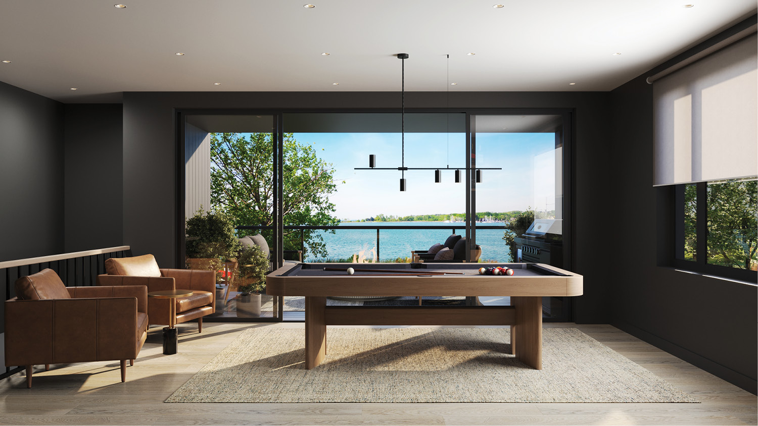 Game room with pool table, built-in bar with shelving, and leather armchair.